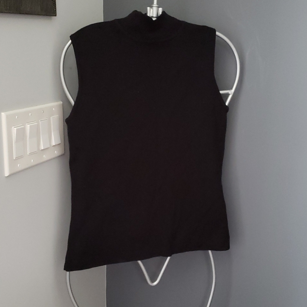 Sleeveless black turtle neck